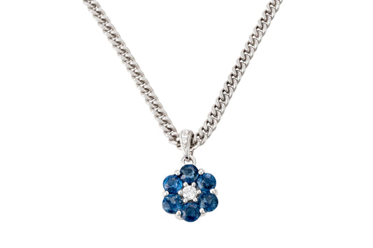 18 Carat white gold clover pendant with sapphire